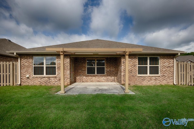 104 Summer Pointe Ln, Madison, AL 35757 - back of house featuring a patio area, brick siding, and roof with shingles