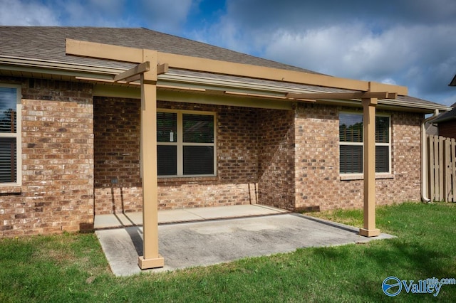104 Summer Pointe Ln, Madison, AL 35757 - rear view of property with brick siding, a patio, and roof with shingles