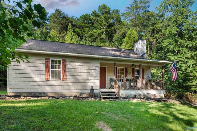 view of front of house featuring a front lawn and a porch