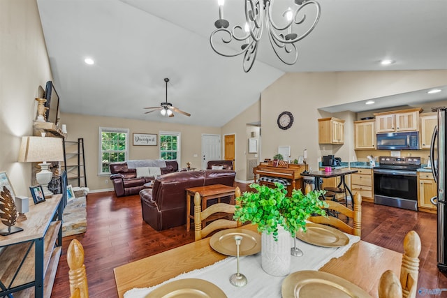 dining space featuring ceiling fan with notable chandelier, dark hardwood / wood-style floors, and high vaulted ceiling