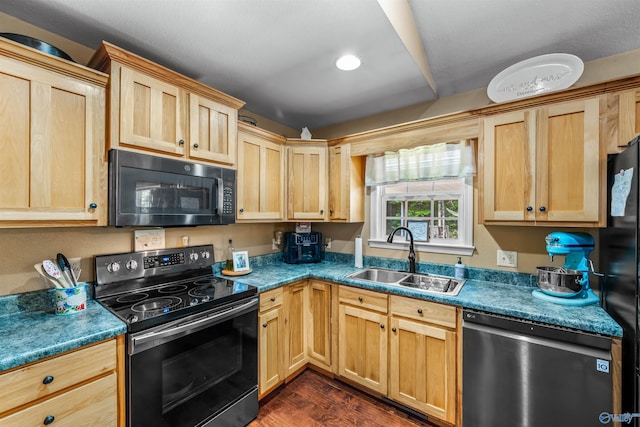 kitchen with black appliances, sink, dark hardwood / wood-style flooring, and light brown cabinets