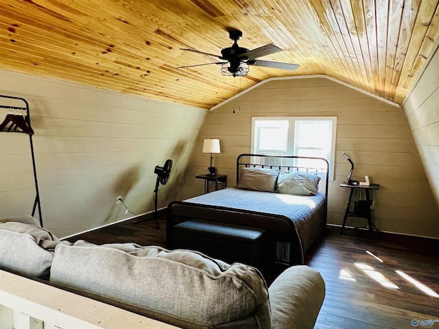 bedroom with ceiling fan, dark wood-type flooring, vaulted ceiling, wooden walls, and wood ceiling