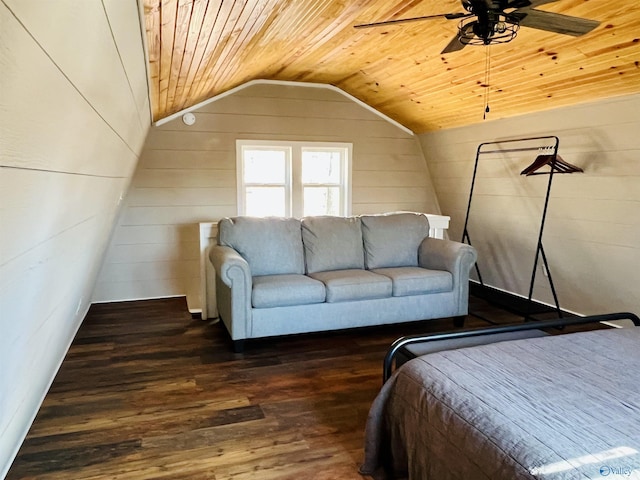 bedroom with wood ceiling, vaulted ceiling, ceiling fan, dark wood-type flooring, and wood walls