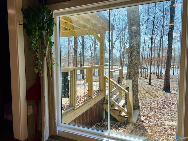 doorway featuring a water view