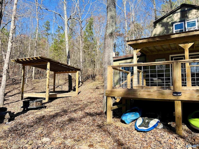 view of yard with a wooden deck