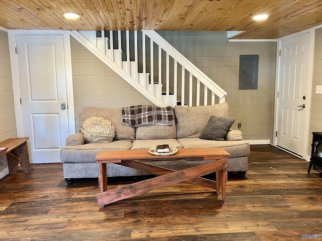 living room featuring wood ceiling, dark wood-type flooring, and electric panel