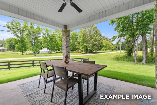 view of patio featuring ceiling fan