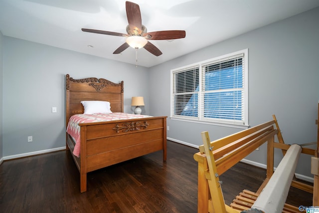 bedroom with ceiling fan and dark hardwood / wood-style floors