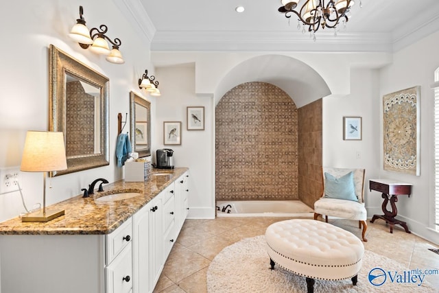 3127 Haddonstone Dr SE, Owens Cross Roads, AL 35763 - full bathroom featuring tile patterned flooring, vanity, a bathtub, crown molding, and baseboards