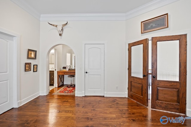 3127 Haddonstone Dr SE, Owens Cross Roads, AL 35763 - entryway with crown molding, wood finished floors, arched walkways, and baseboards