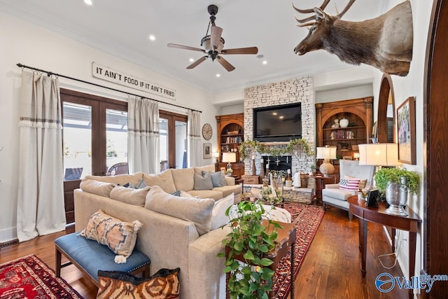3127 Haddonstone Dr SE, Owens Cross Roads, AL 35763 - living area with a ceiling fan, recessed lighting, dark wood-type flooring, french doors, and crown molding
