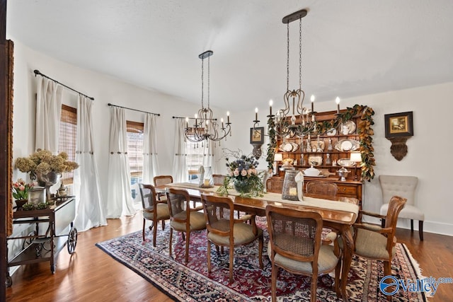 3127 Haddonstone Dr SE, Owens Cross Roads, AL 35763 - dining area featuring a chandelier and wood finished floors