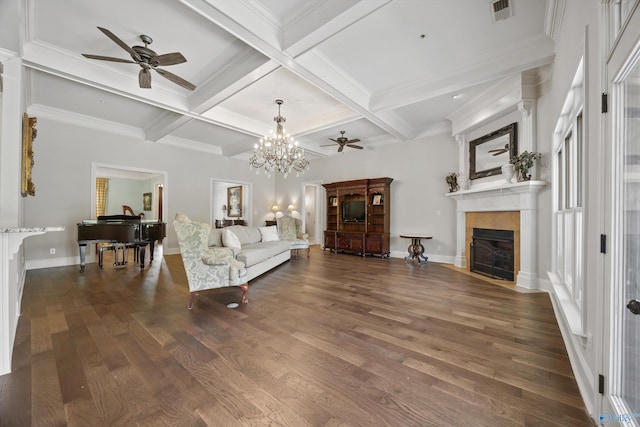 living room featuring visible vents, beam ceiling, ceiling fan with notable chandelier, and a tile fireplace