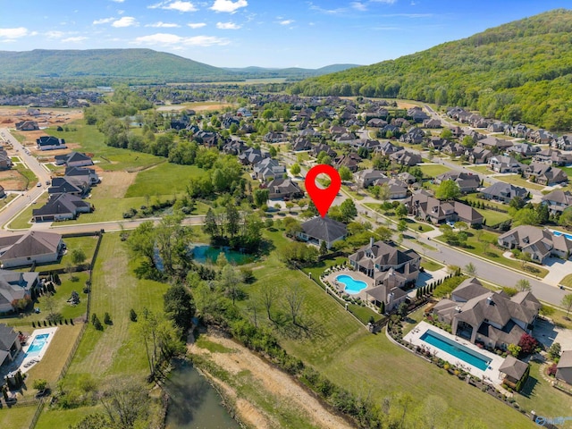 aerial view featuring a residential view and a mountain view