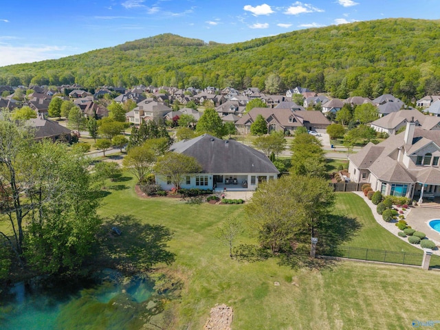 bird's eye view with a residential view and a forest view
