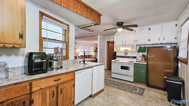 325 Crestview St, Athens, AL 35611 - kitchen featuring white appliances, a ceiling fan, under cabinet range hood, and white cabinetry