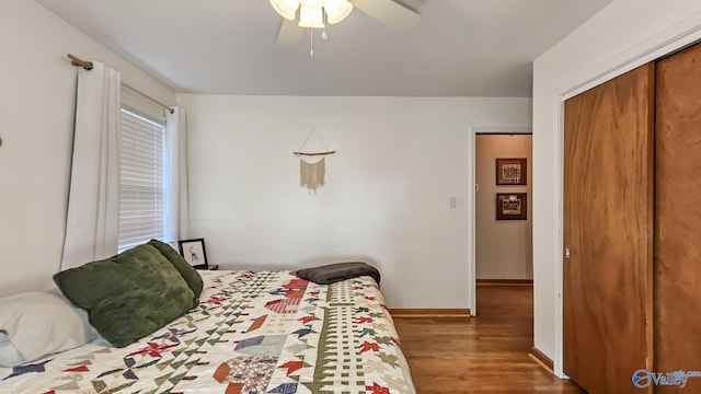 325 Crestview St, Athens, AL 35611 - bedroom featuring wood finished floors, a closet, and ceiling fan