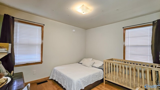 325 Crestview St, Athens, AL 35611 - bedroom featuring wood finished floors