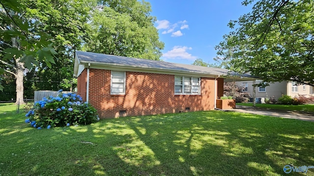 325 Crestview St, Athens, AL 35611 - view of front facade with brick siding, crawl space, and roof with shingles