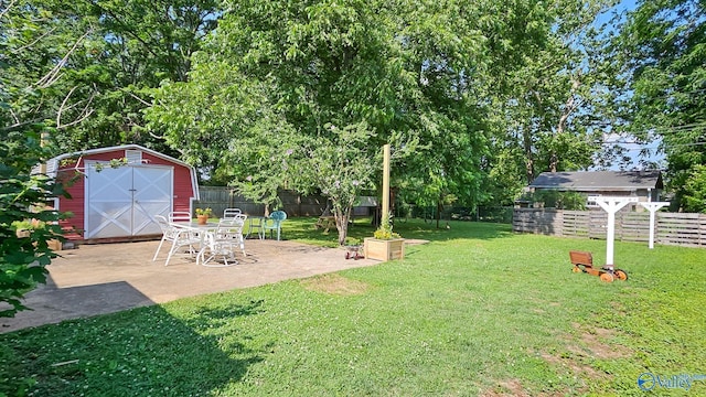 325 Crestview St, Athens, AL 35611 - fenced backyard featuring a storage shed and a patio