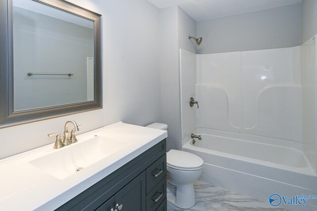 full bathroom featuring vanity, toilet, tile patterned floors, and bathtub / shower combination