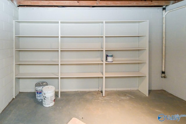 interior space featuring concrete block wall