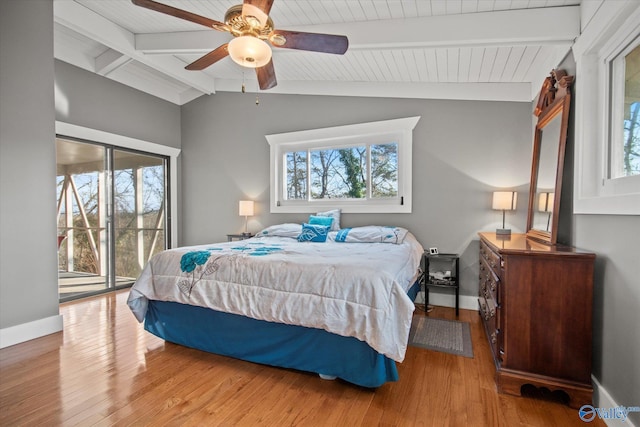 bedroom with multiple windows, access to outside, ceiling fan, and light hardwood / wood-style floors