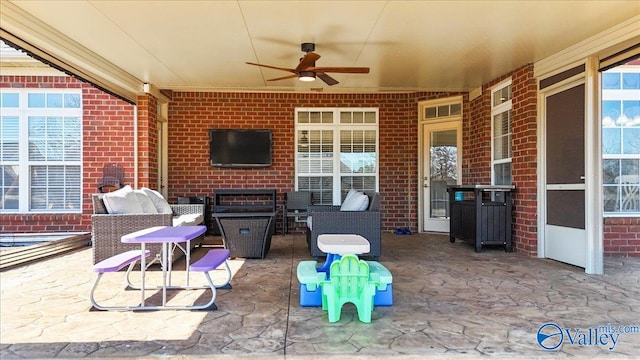 view of patio with a ceiling fan