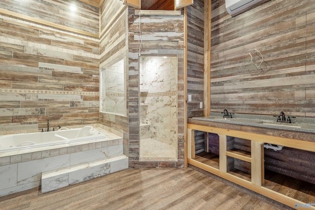 bathroom with plus walk in shower, hardwood / wood-style floors, and wood walls