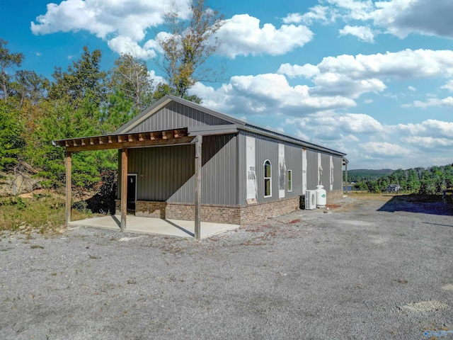 exterior space with central air condition unit