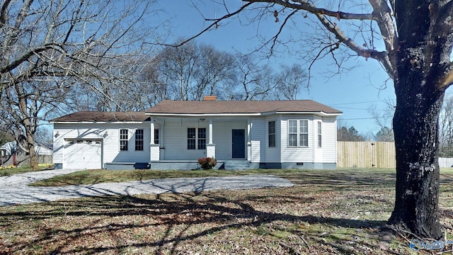 view of front of house featuring fence, covered porch, a chimney, a garage, and crawl space