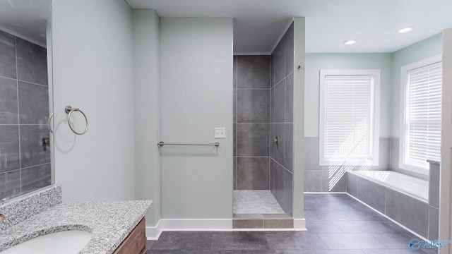 full bath featuring vanity, recessed lighting, walk in shower, tile patterned floors, and a bath