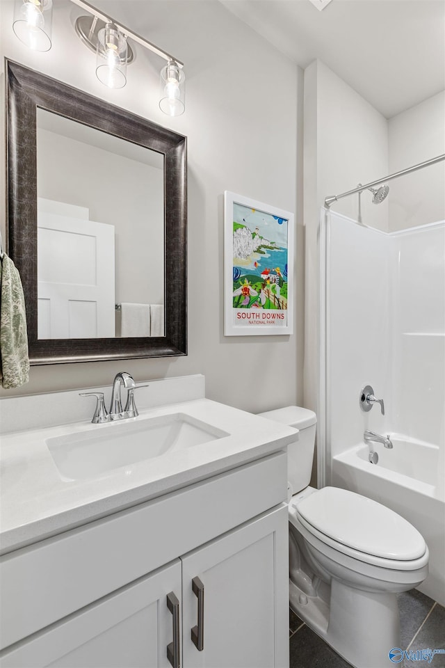 full bath featuring vanity, toilet, and tub / shower combination