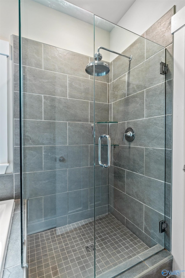 bathroom with a stall shower