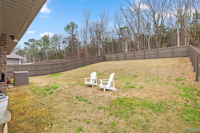 view of yard featuring cooling unit and a fenced backyard