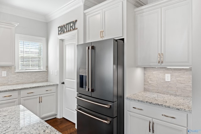 kitchen with crown molding, white cabinetry, high quality fridge, and dark wood-type flooring