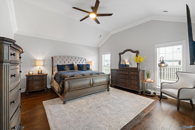 bedroom with dark wood-style floors, visible vents, ornamental molding, vaulted ceiling, and baseboards