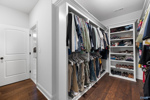 spacious closet with visible vents and wood finished floors