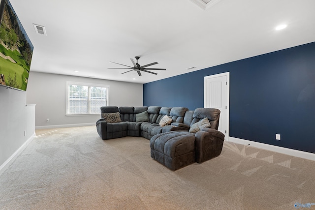 carpeted living area featuring a ceiling fan, recessed lighting, visible vents, and baseboards