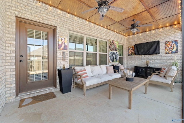 view of patio featuring an outdoor living space and a ceiling fan