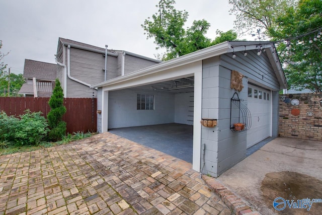 717 NE Eustis Ave, Huntsville, AL 35801 - garage with fence