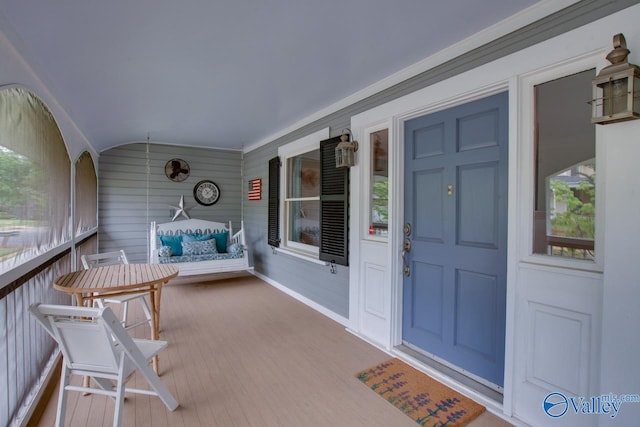 717 NE Eustis Ave, Huntsville, AL 35801 - view of exterior entry with a porch