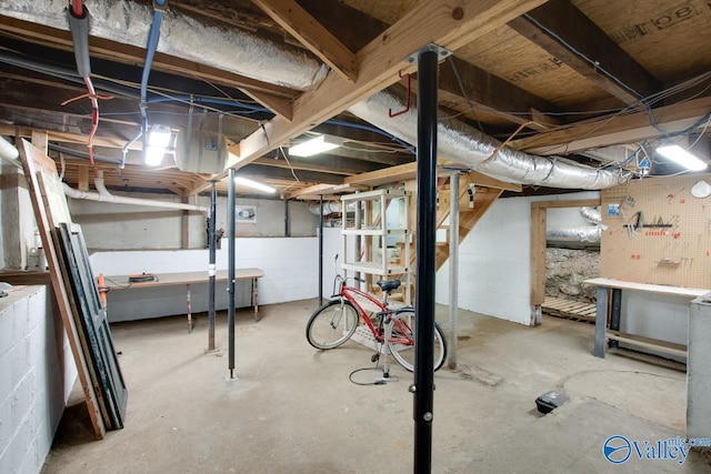 717 NE Eustis Ave, Huntsville, AL 35801 - unfinished below grade area with a workshop area
