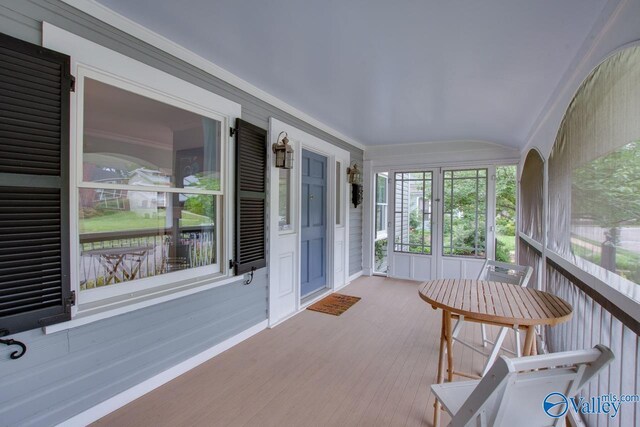 717 NE Eustis Ave, Huntsville, AL 35801 - sunroom with lofted ceiling