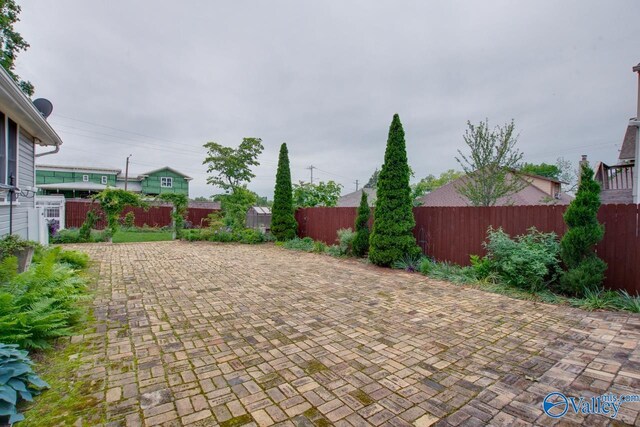 717 NE Eustis Ave, Huntsville, AL 35801 - view of patio / terrace featuring a fenced backyard