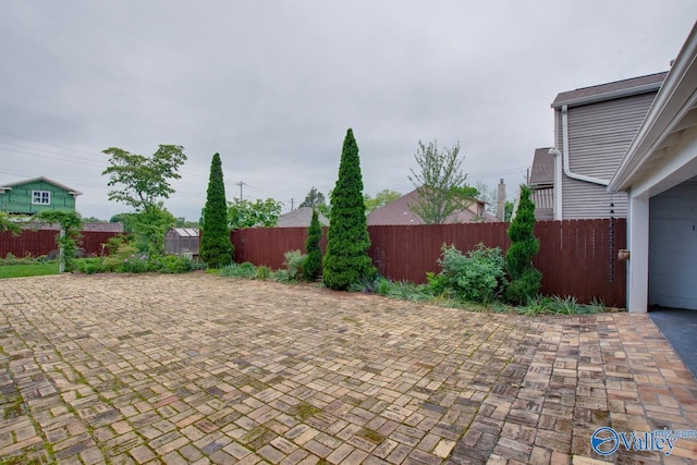 717 NE Eustis Ave, Huntsville, AL 35801 - view of patio featuring a fenced backyard