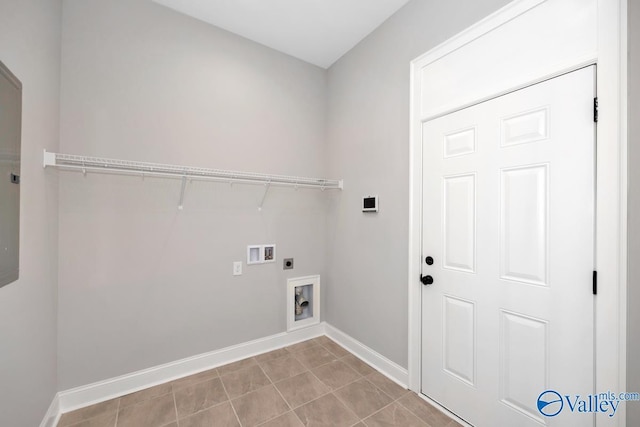 laundry room featuring light tile patterned floors, laundry area, washer hookup, baseboards, and electric dryer hookup