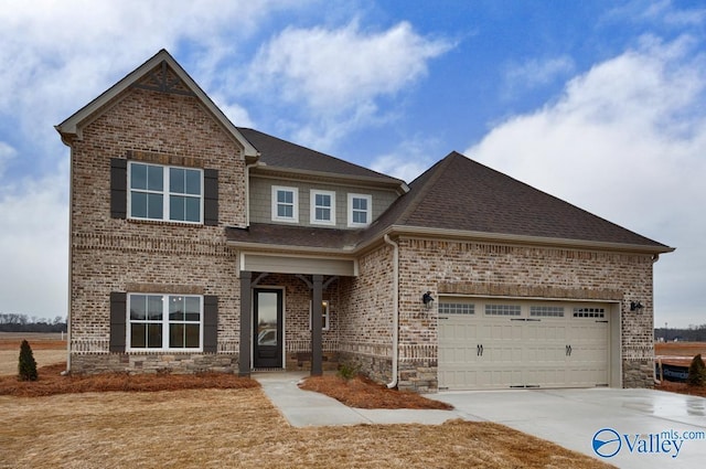 view of front of house featuring driveway, a shingled roof, a garage, and brick siding