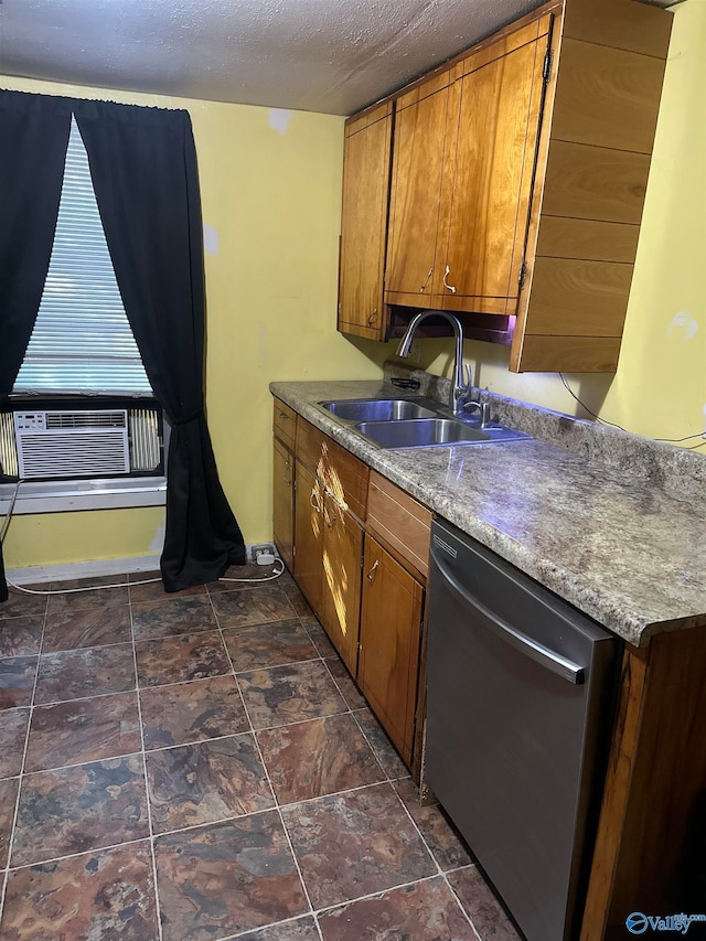 kitchen featuring sink, cooling unit, stainless steel dishwasher, and a textured ceiling