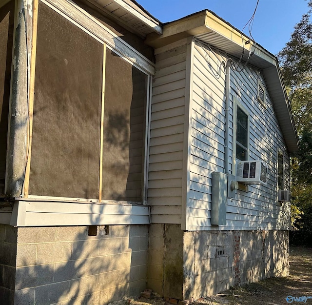 view of home's exterior featuring cooling unit